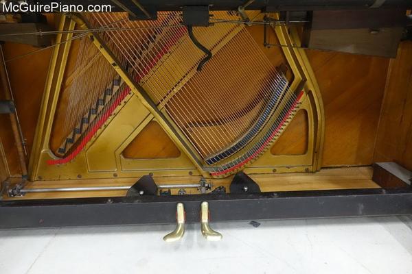 Adam Schaaf Piano bottom board is reinstalled